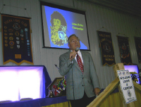 Dewey Carl as a speaker at a convention